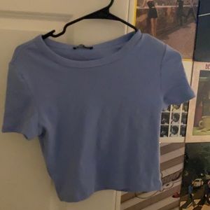 Blue cropped shirt